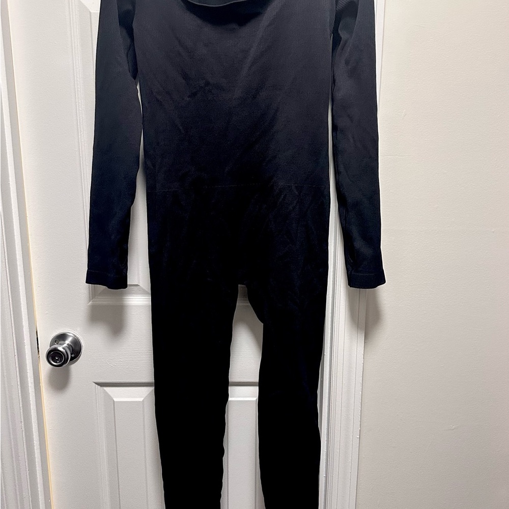 Sleek Black Long Sleeve Jumpsuit with Crew Neckline